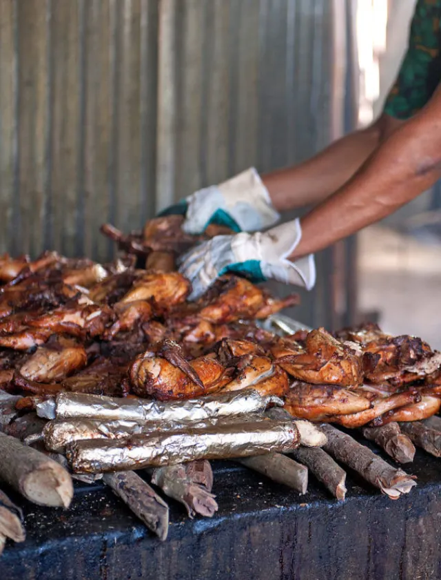 Jerk chicken in barbeque pit